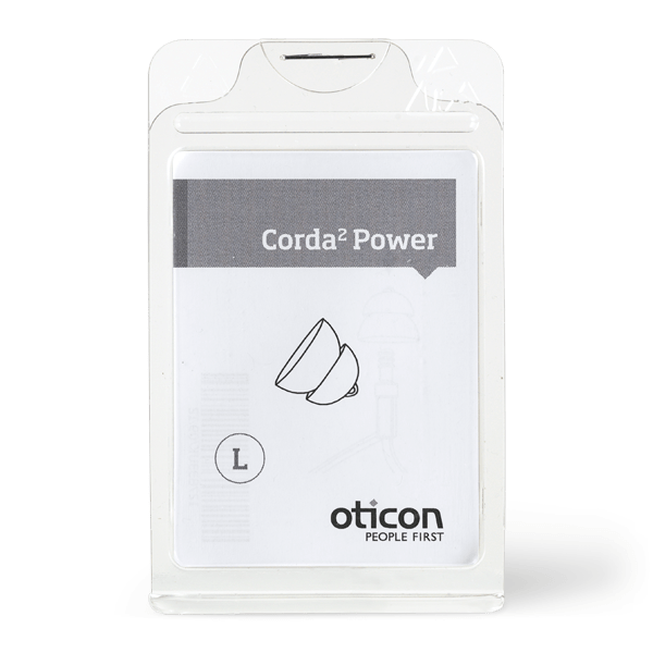 A clear plastic package contains a Corda 2 Power Dome hearing aid accessory, size L. The label shows a product illustration, the Oticon logo, and the text "PEOPLE FIRST.